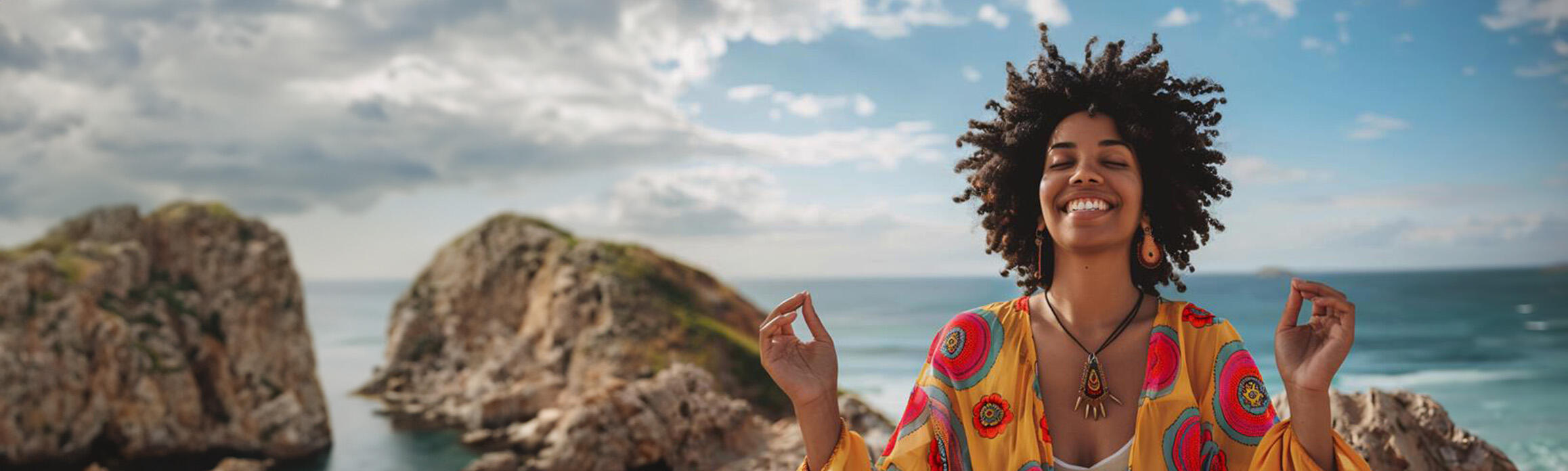 Lady meditating in front of the sea